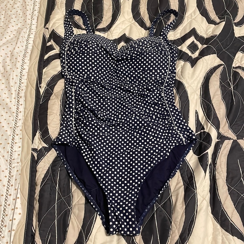 Navy and white polka dot niptuck swimsuit